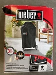 Weber 7148 Premium Grill Cover 18" Black Brand New. Fixed Price $15.00.