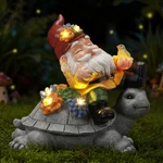 Solar-powered Garden Gnomes: Turtle & Flower Statues For Outdoor Decor. Fixed Price $27.99.