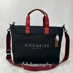 Coach Men's Canvas Tote Bag 38 In Black CJ486 Nwt. Fixed Price $239.00.