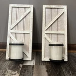 2 Beautiful Farmhouse Style Wall Holders With Simply Collections Candles. Fixed Price $50.00.
