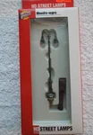 Ho Scale New In Box Cornerstone Series Double Arm Street Lamp Light #933-1080. Fixed Price $19.99.