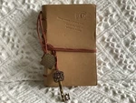 Studio Nouveau Mini Softcover Travel Journal With Leather Accents And Medallions. Fixed Price $11.11.