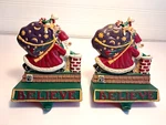Set 2 Midwest Cannon Falls Mary Engelbreit "believe" Santa Stocking Hanger Iron. Fixed Price $55.37.