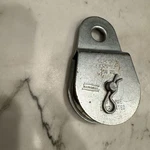 National Hardware 2IN Silver Fixed Single Pulley Steel Body With Zinc Sheave. Fixed Price $12.00.