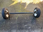 Haul-master Trailer Axle With Wheels And Springs. Fixed Price $170.00.