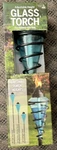 Sunnydaze Glass Patio Torch With Metal Swirl -25- 66-INCH Adjustable Height. Fixed Price $139.99.