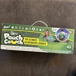 The Official Green Pouch Couch As Seen On Tv New. Fixed Price $18.00.