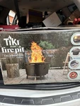 Tiki Celebration Smokeless Wood Outdoor Fire Pit W/ Cover, Black Metal Round. Fixed Price $80.00.
