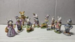 9 Pc Set Of Miniature Cast Iron Rabbits Easter Villiage Gardeners TB84. Fixed Price $20.00.