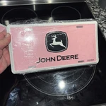 John Deere Pink License Plate. Fixed Price $12.00.