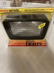 Agri Bright 900W F/H9406-12 V, 1229635 Halogen Flood Light 50WATT. Fixed Price $15.00.