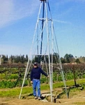 21FT Aermotor Windmill Style Tower, New, With Galvanized Platform & Anchors. Fixed Price $2000.00.