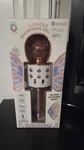 Simply Tech Karaoke Microphone Speaker With Bluetooth Connectivity New In Box. Fixed Price $5.00.